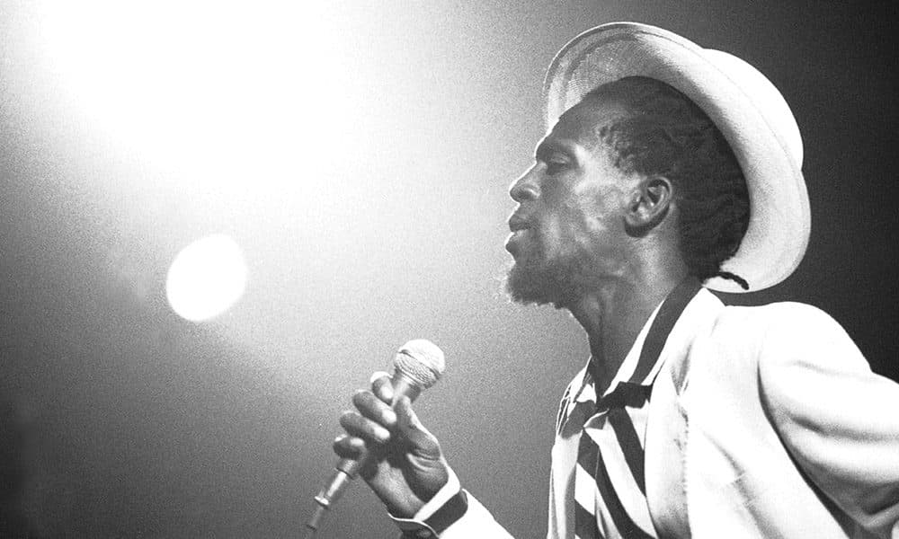 Gregory Isaacs performing on stage